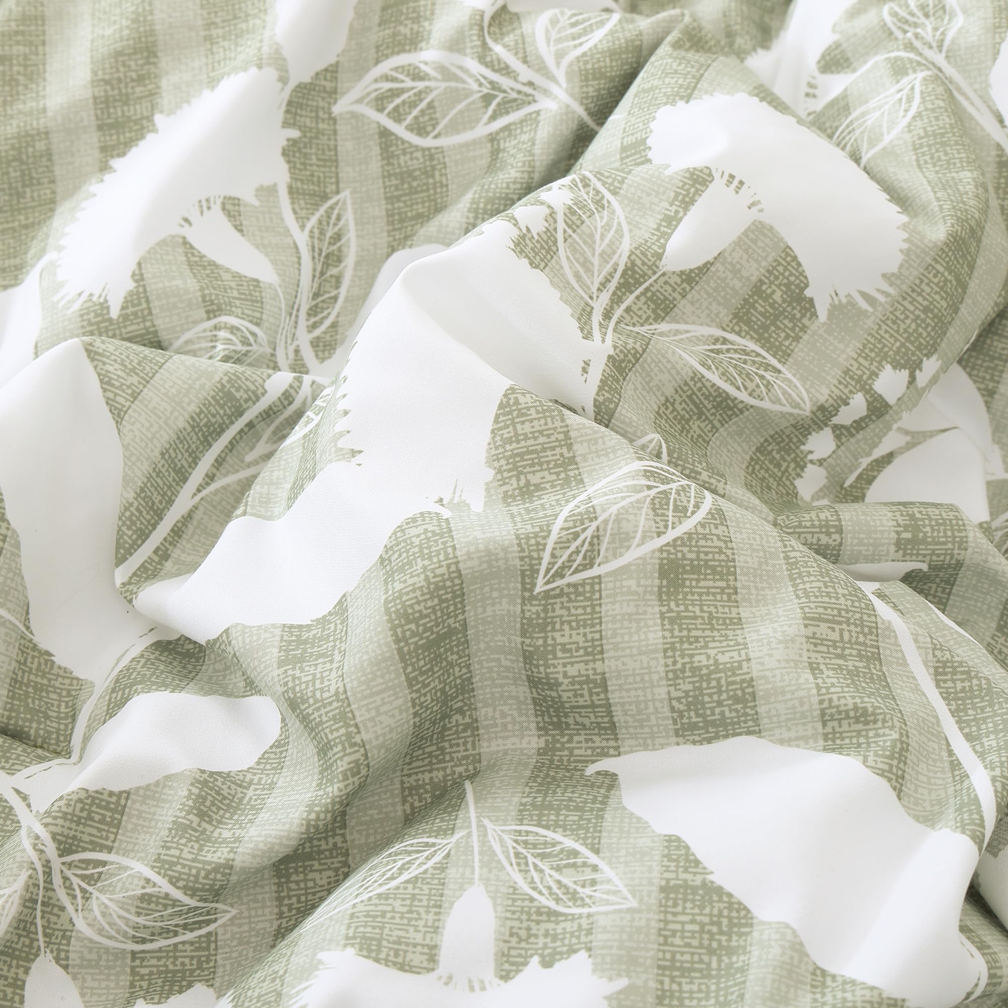 BLOOMHAVEN arranged sheets, shams and pillowcases displayed to show complete seven-piece set