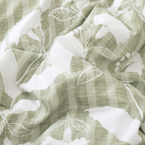 BLOOMHAVEN arranged sheets, shams and pillowcases displayed to show complete seven-piece set