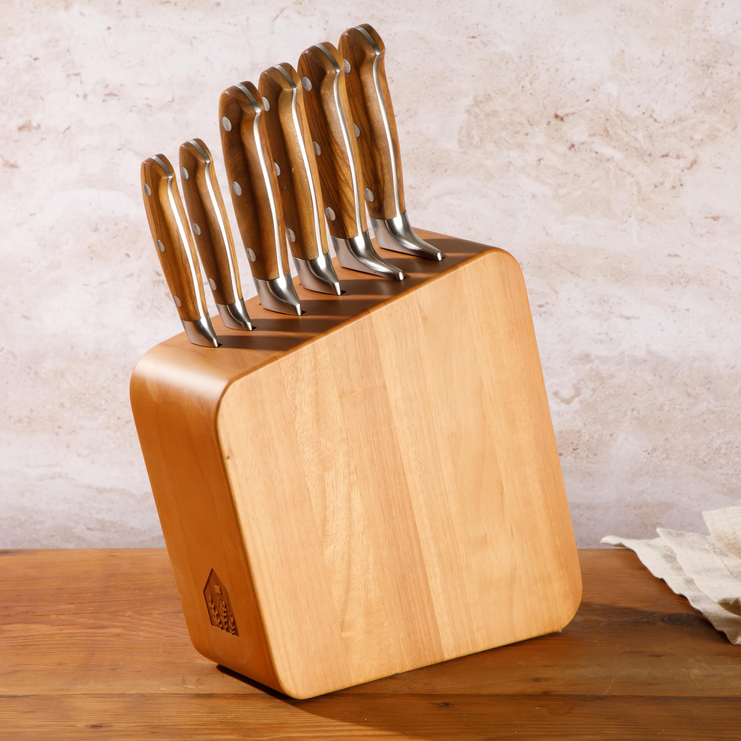 bloomhouse close-up Italian olive wood handle highlighting rustic grain and grip benefit