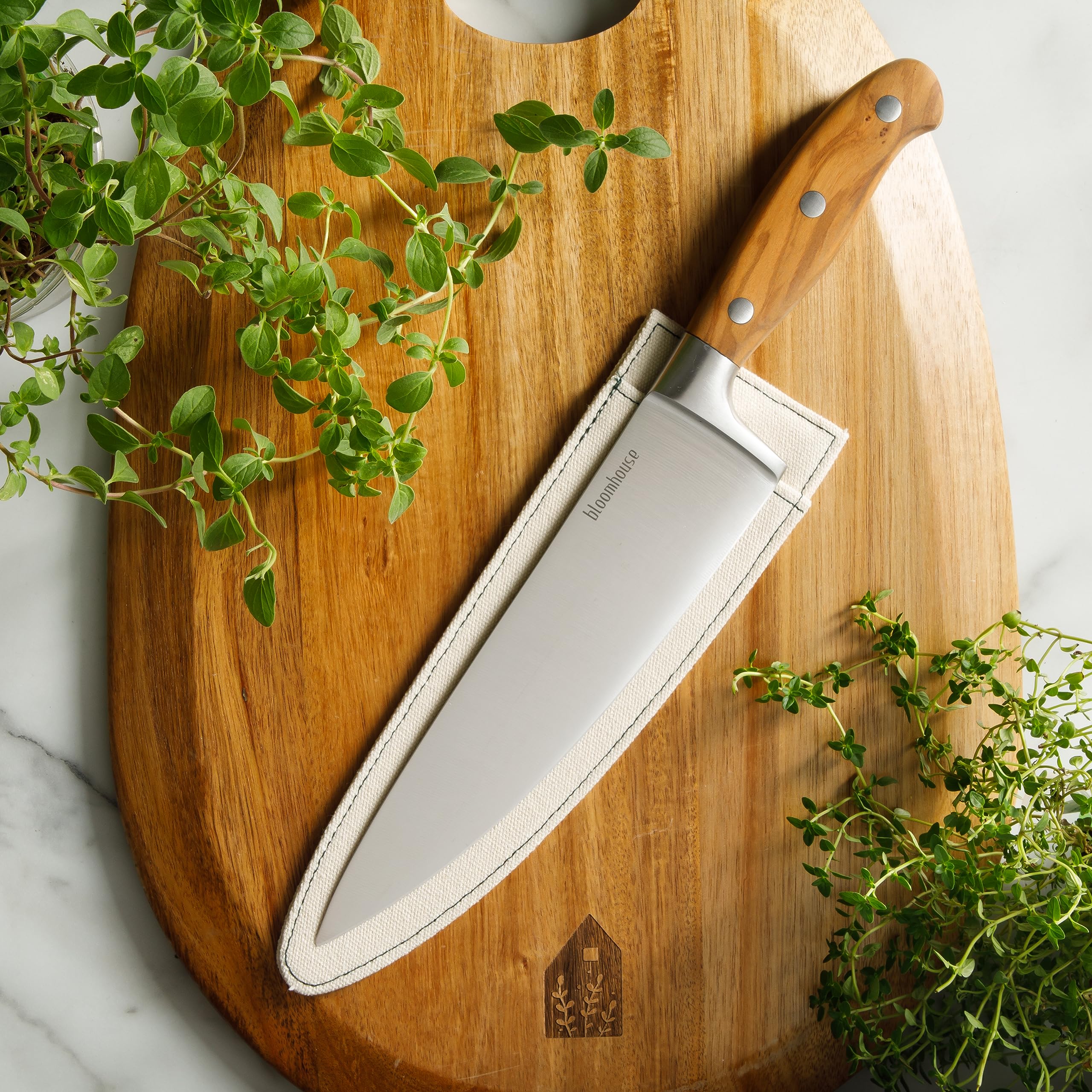 bloomhouse olive wood handle close-up showing grain and ergonomic grip