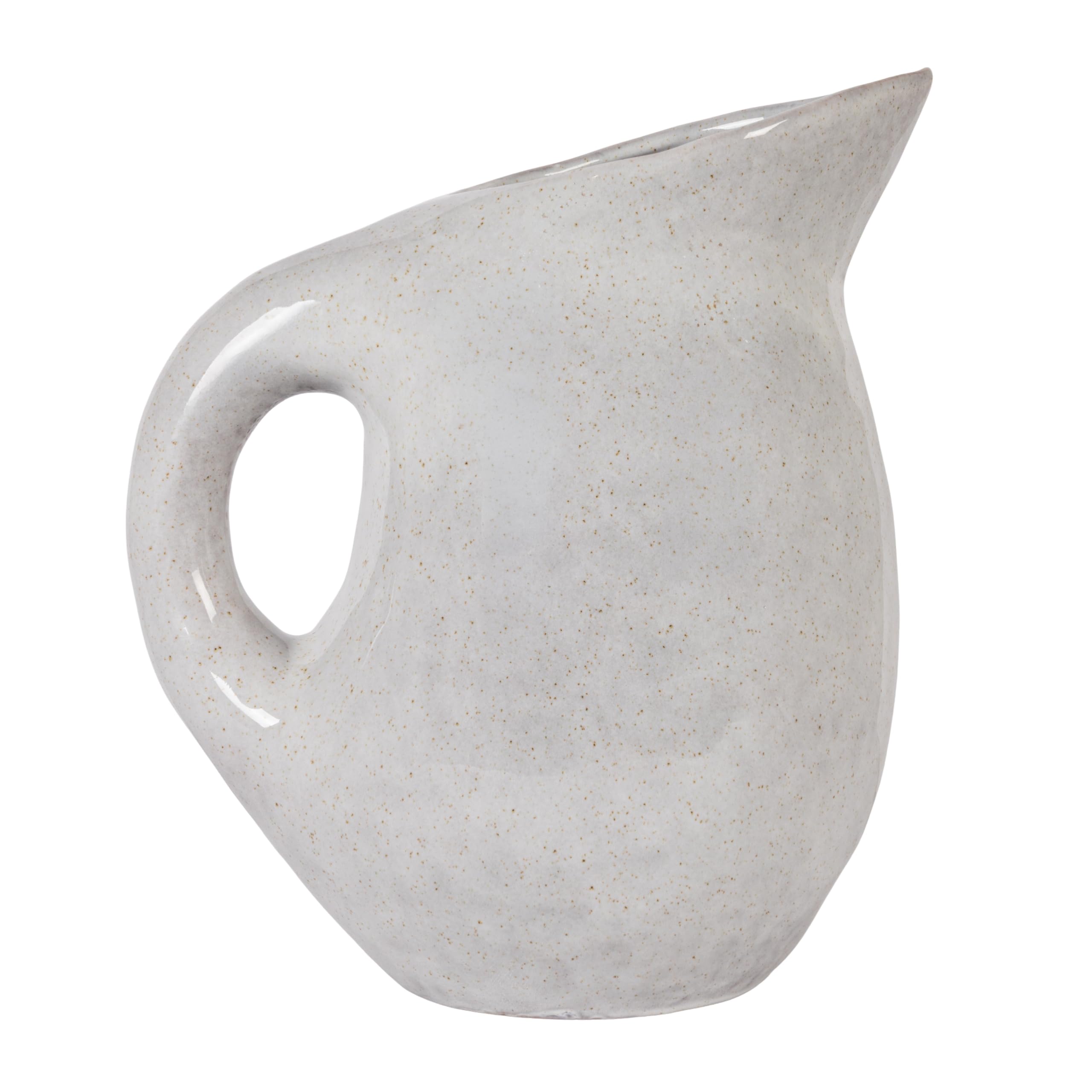 Bloomingville pitcher on open kitchen shelf enhancing neutral modern decor