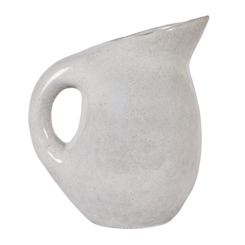Bloomingville pitcher on open kitchen shelf enhancing neutral modern decor