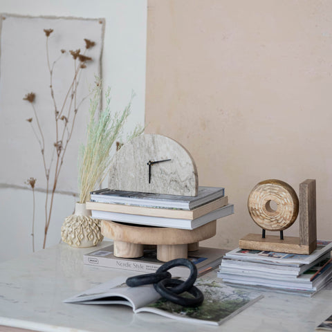 Bloomingville styled living room mantel demonstrating decorative impact and cohesive look