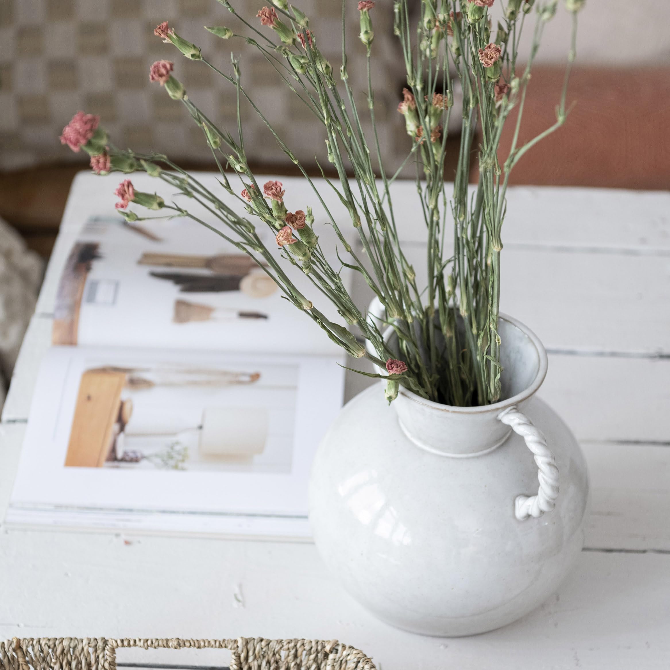 Bloomingville vase held in hands illustrating easy carrying benefit