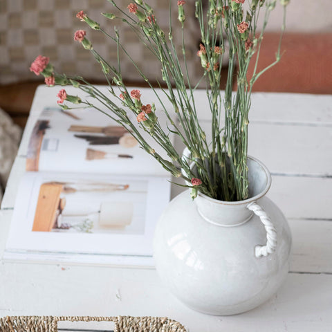 Bloomingville vase held in hands illustrating easy carrying benefit