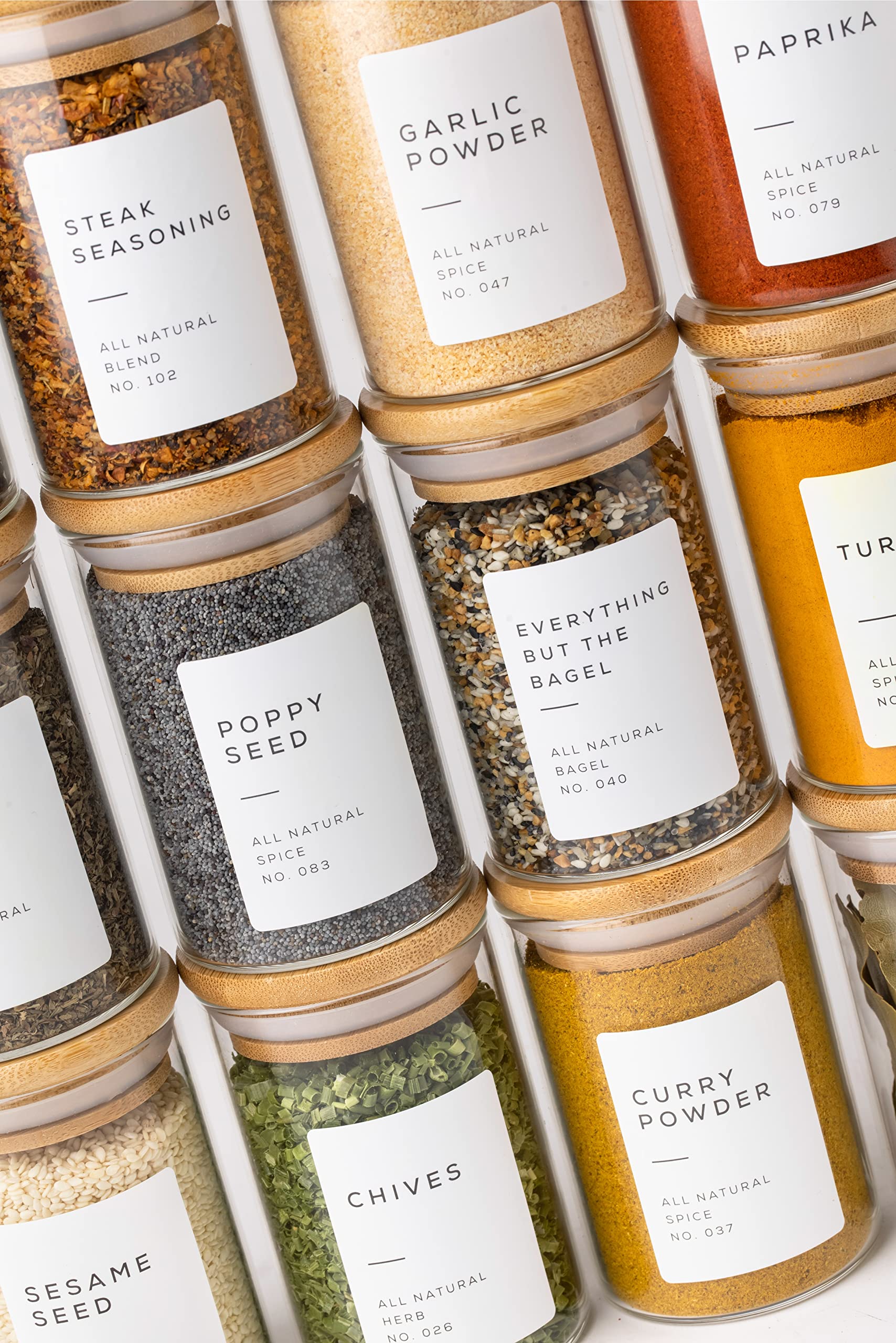 Bloomondo front view of 12 glass spice jars showing tidy pantry benefit