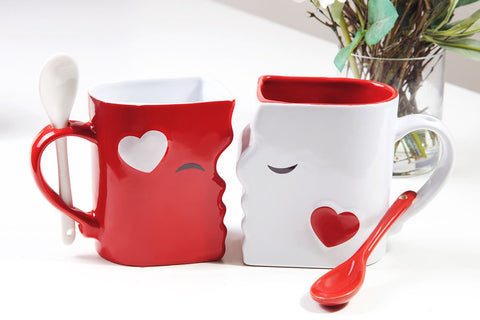 Blu Devil two mugs nested to form a kiss, romantic display for couples