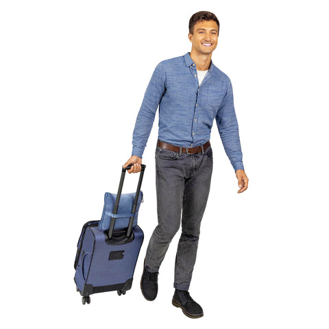 BlueHills packed pillow clipped to suitcase handle demonstrating quick access and travel convenience benefit
