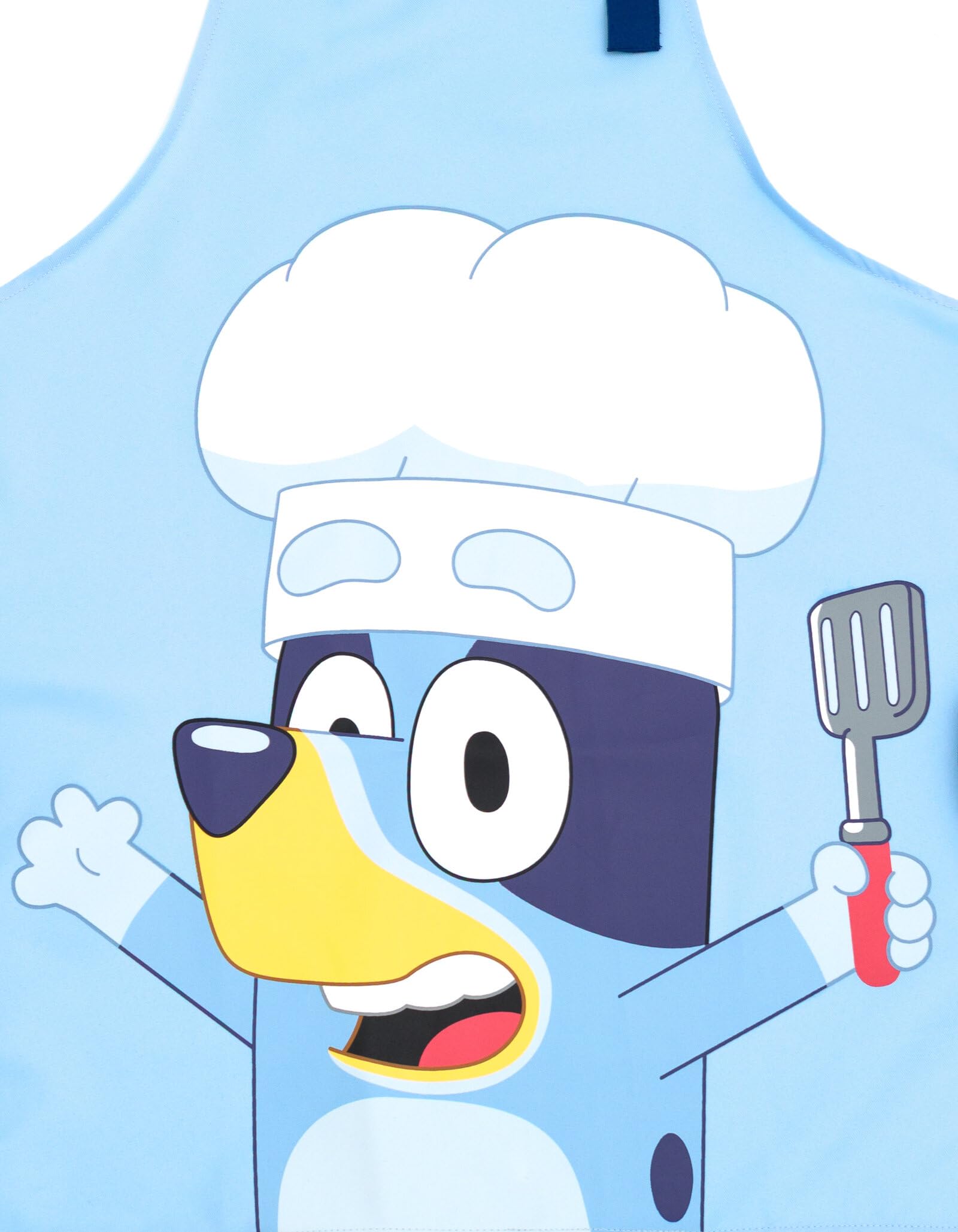 Bluey apron in use with toddler baking showing stain protection and play confidence