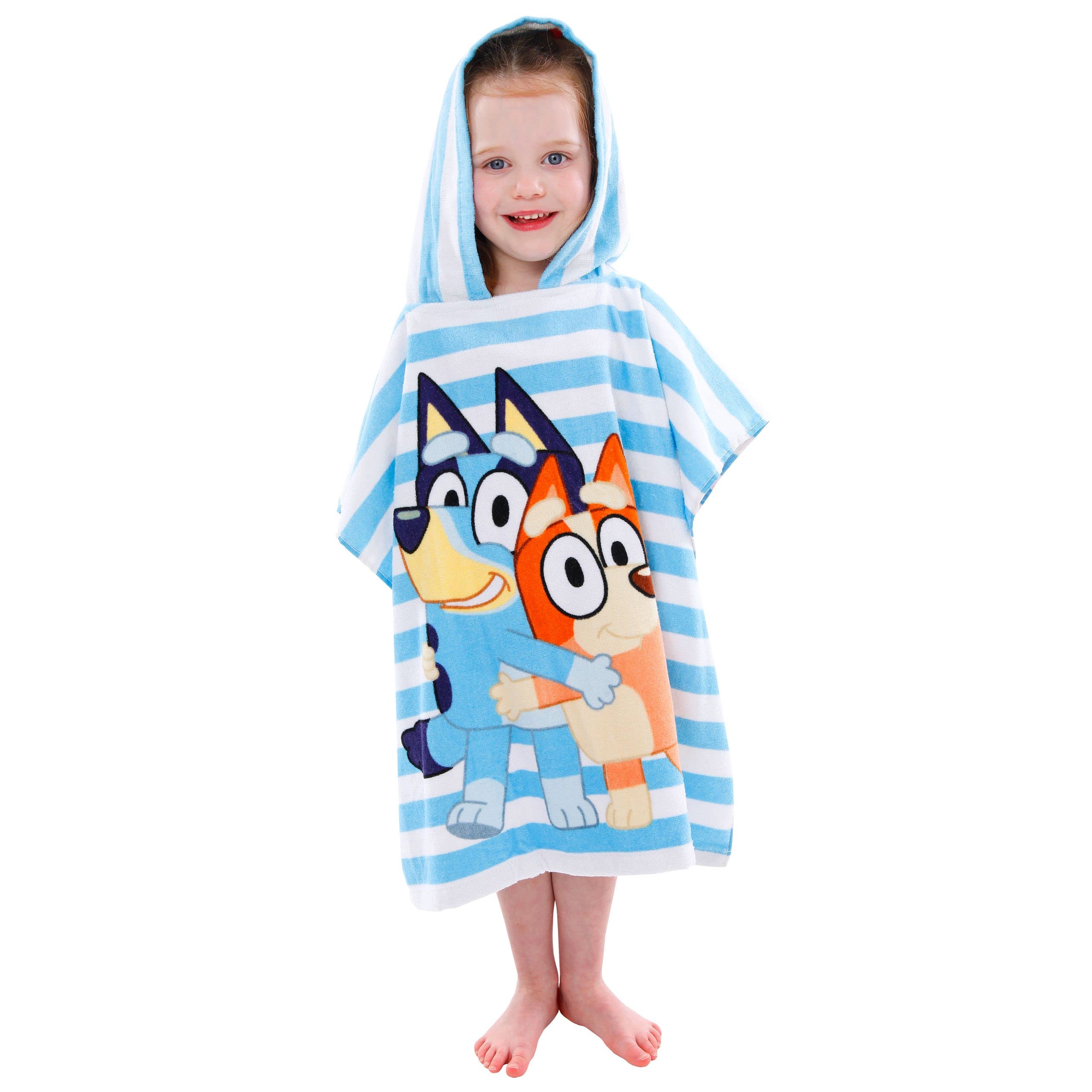 Child wearing Bluey towel at pool staying warm after swim