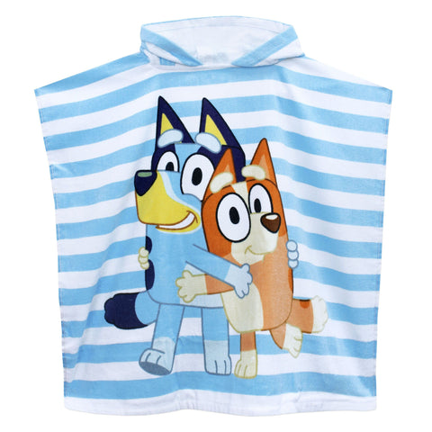 Bluey towel on sandy beach keeping child warm and protected