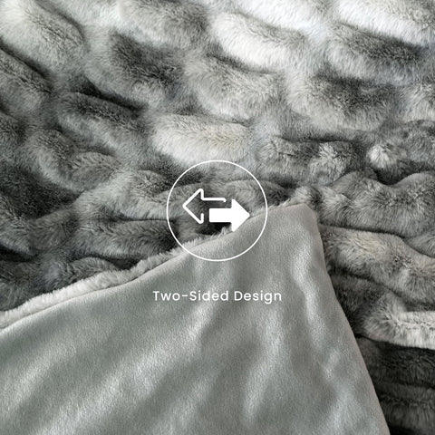 blunique throw draped on sofa illustrating styling and living room warmth