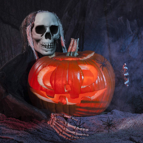 Boao skulls staged in a haunted centerpiece to enhance spooky ambiance
