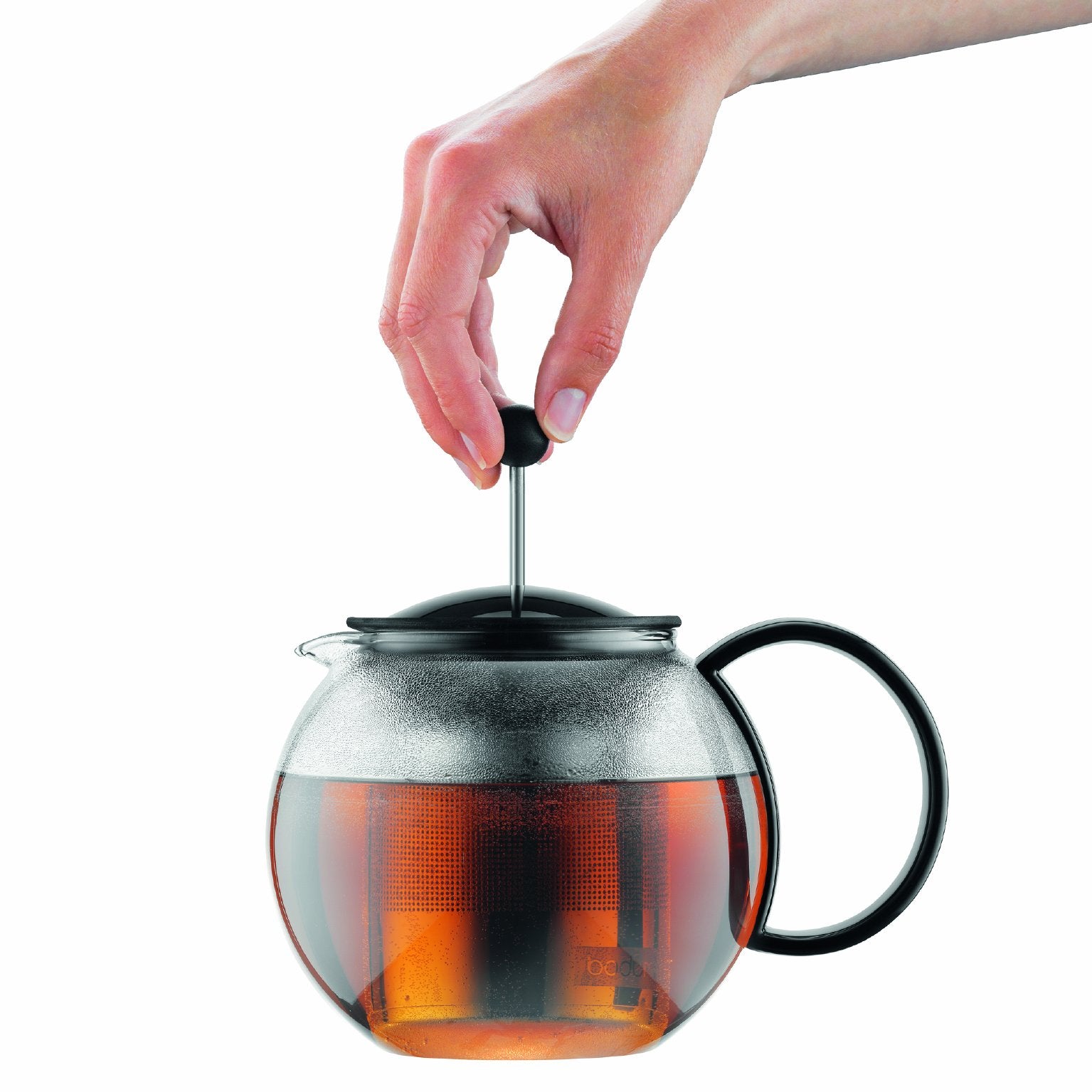 Bodum Assam next to a teacup for size comparison, shows 34oz capacity benefit