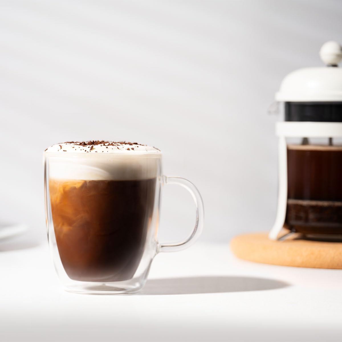 bodum mug holding iced coffee with no condensation for tidy surfaces