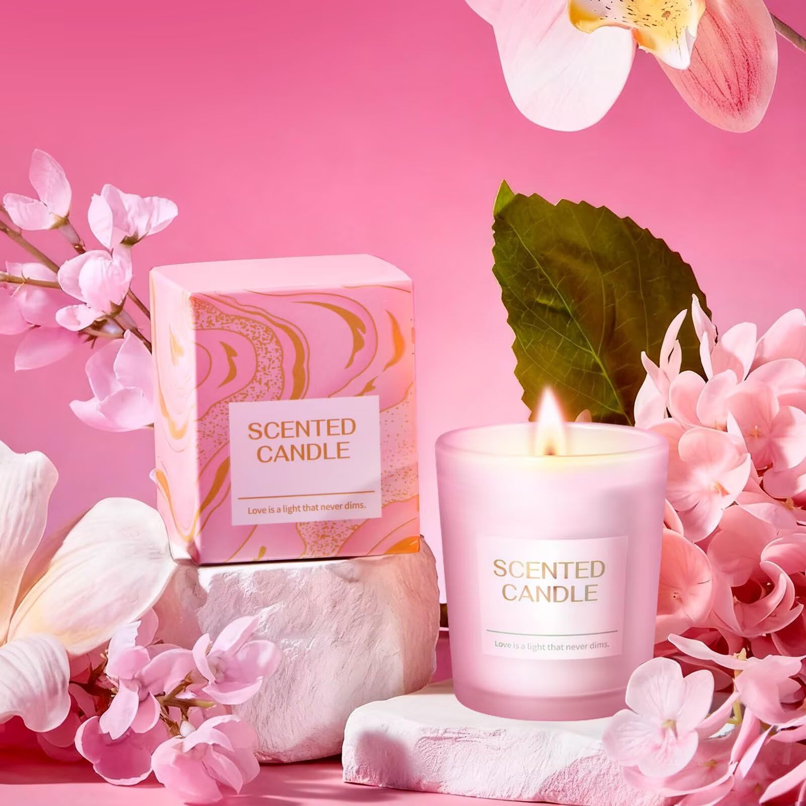BodyRefresh rose-scented candle lit in low light, creates calming aromatic atmosphere