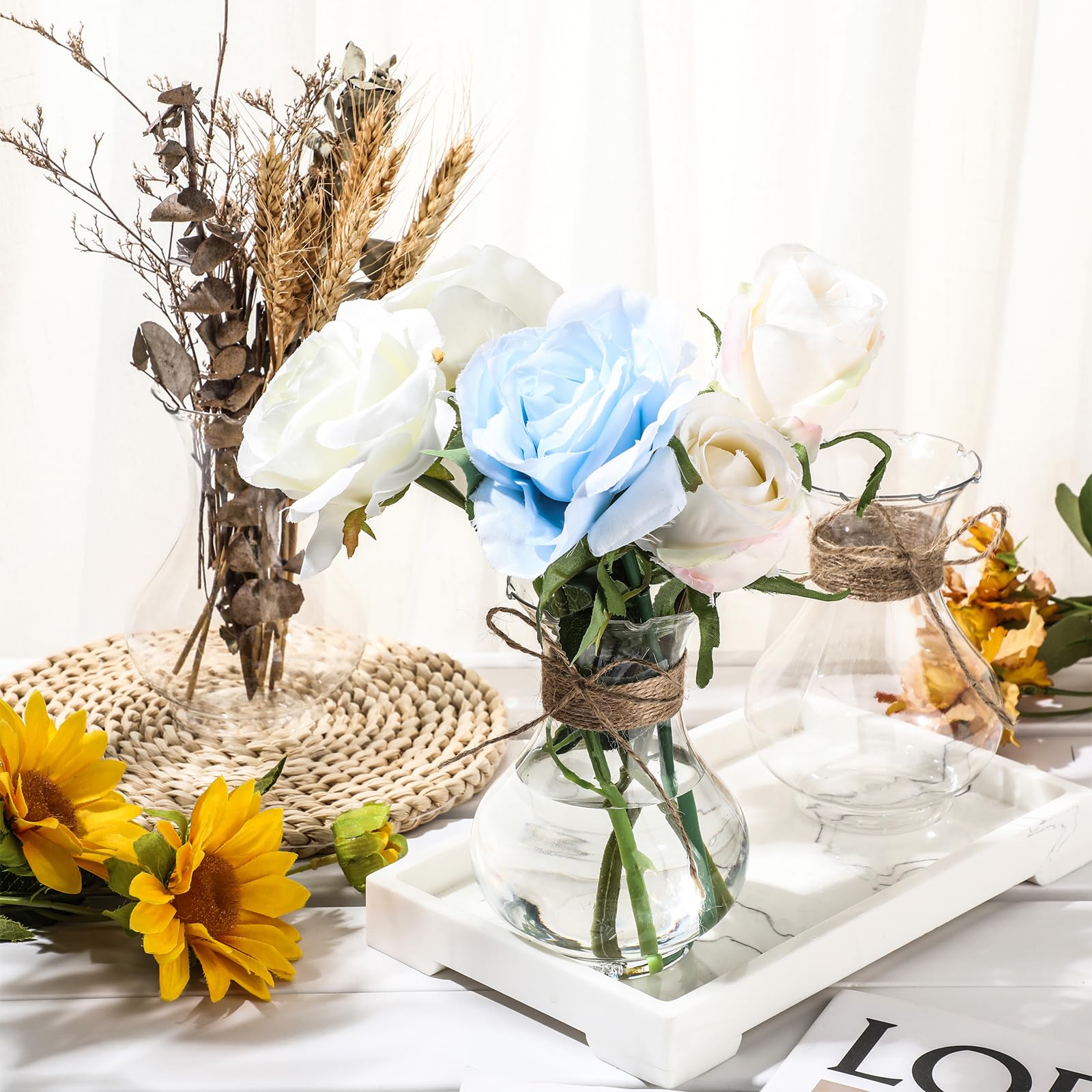 Bokon group of vases as a clustered centerpiece illustrating coordinated event styling