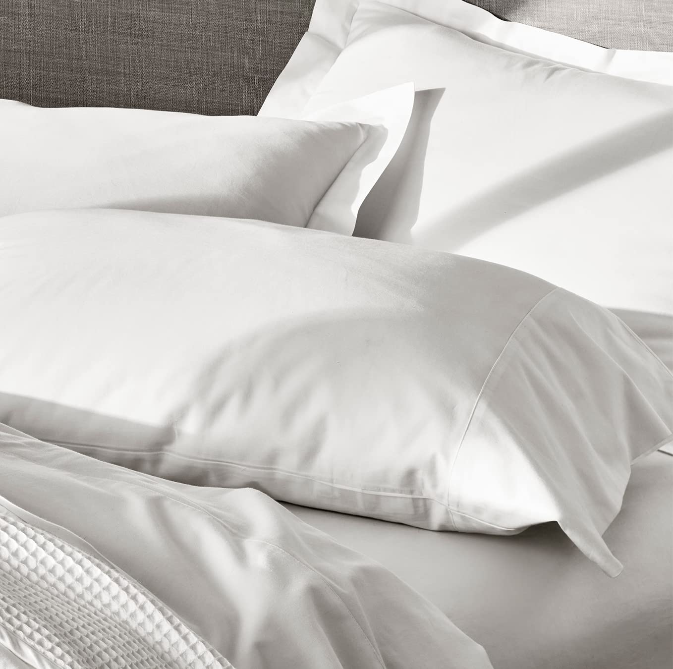BOLL & BRANCH hem detail showing 7-inch hem for a tailored refined edge