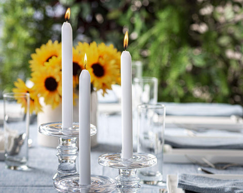 BOLSIUS white tapers in a candelabra, illustrating elegant event use