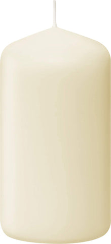 Stacked Bolsius ivory pillar candles showing organized storage and ready supply