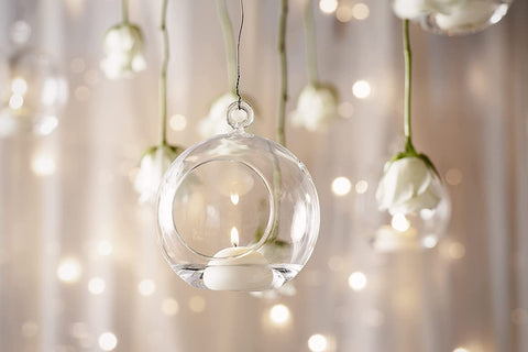Bolsius candles floating amid petals for decorative arrangements and visual appeal benefit