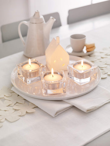 BOLSIUS tea light in glass holder on table creating warm ambience