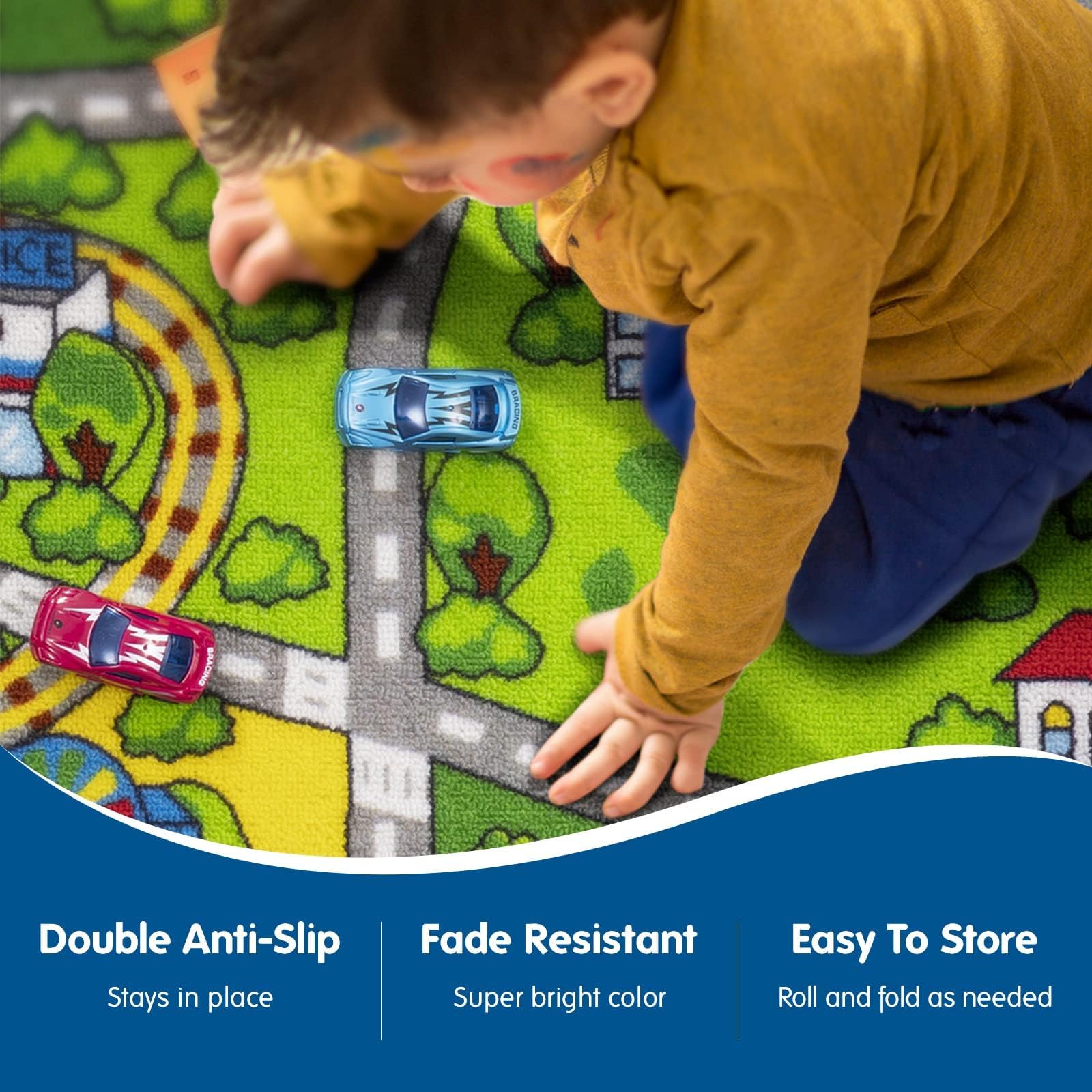 Booooom Jackson rug in use with toy trains demonstrating stable play surface and engagement