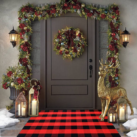 Bottalive rug layered with welcome mat for elegant porch styling