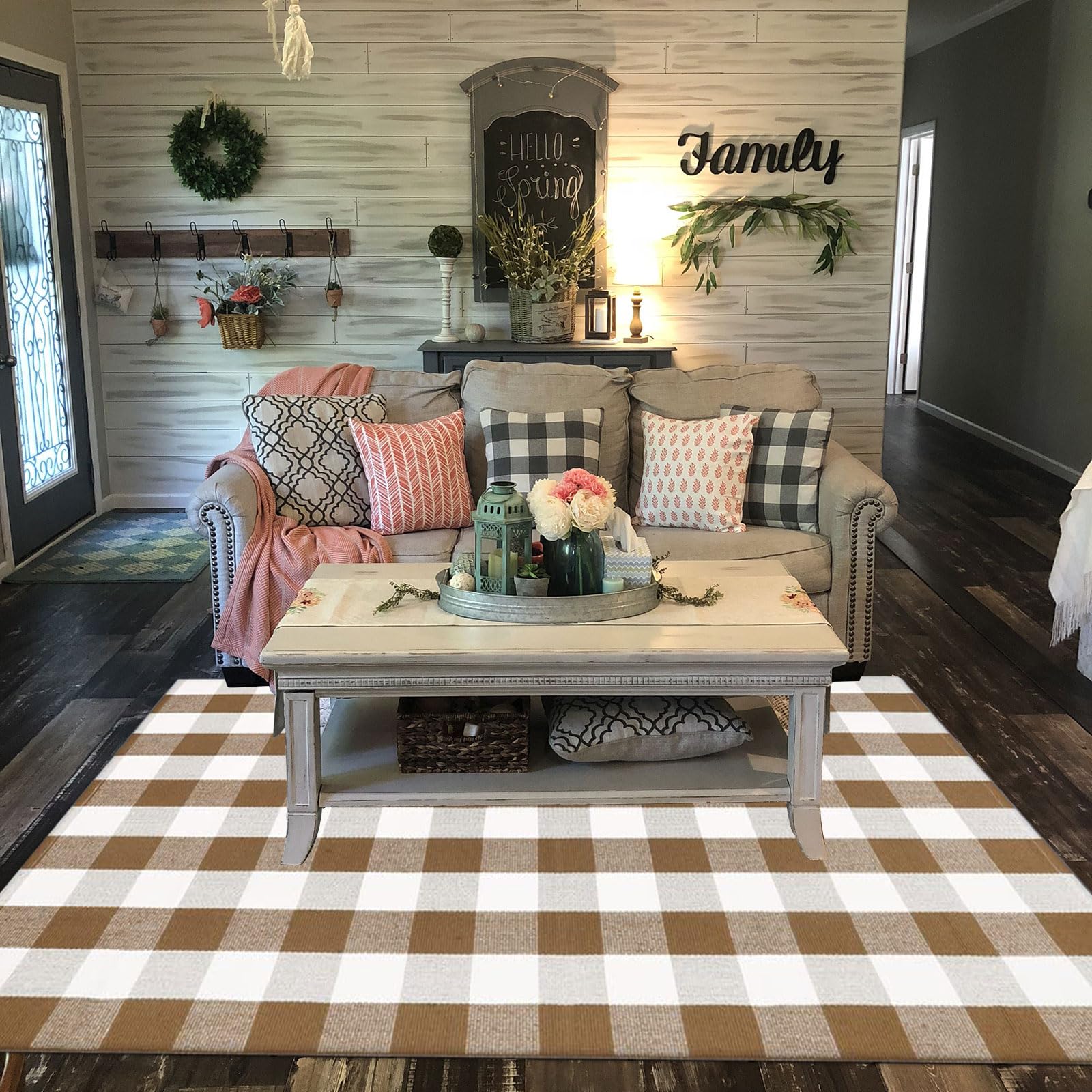 Bottalive rug layered with welcome mat demonstrating layered porch styling