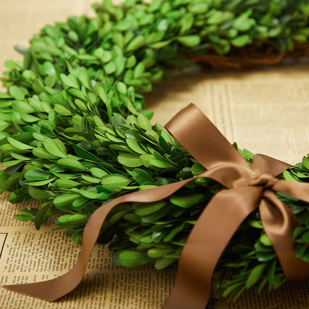 BOXWOOD WORLD wreath hung on interior door demonstrating easy installation and instant decor uplift