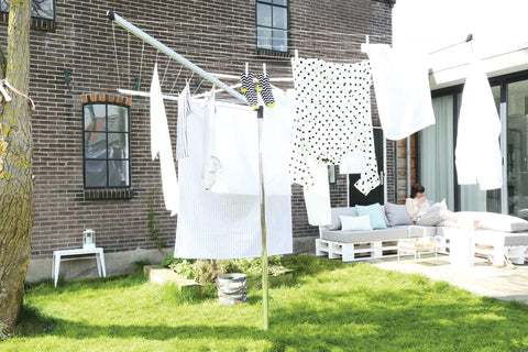 Brabantia Topspinner ground spike installed flush with lawn illustrating safe, stable setup