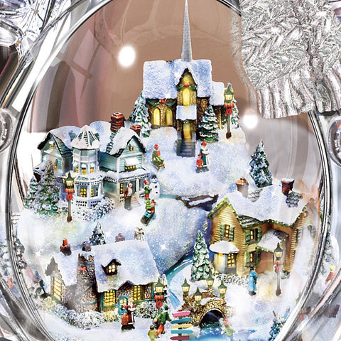 The Bradford Exchange snowman side view showing miniature train motion and glowing village