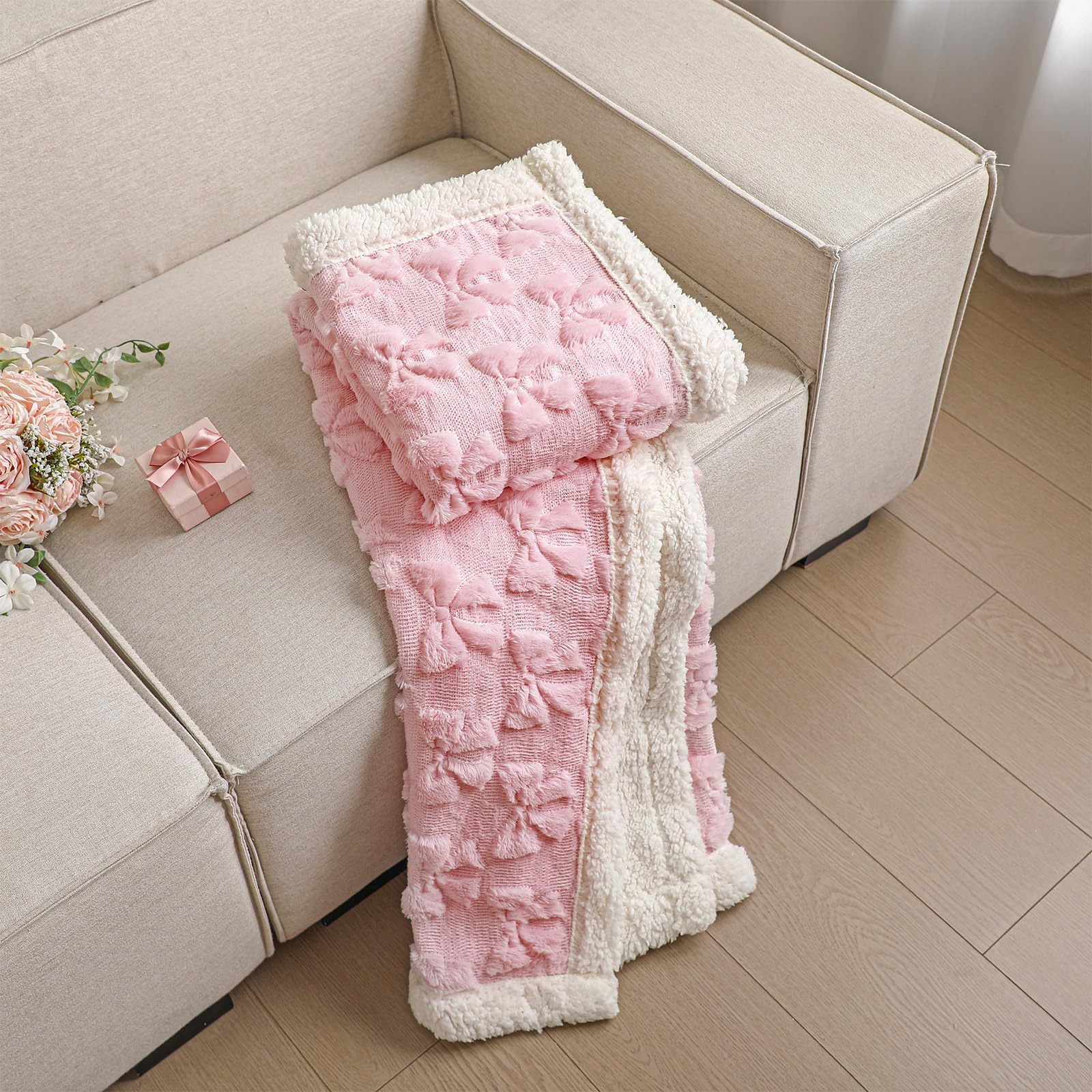 Breling throw beside ruler indicating 50x60 size for coverage