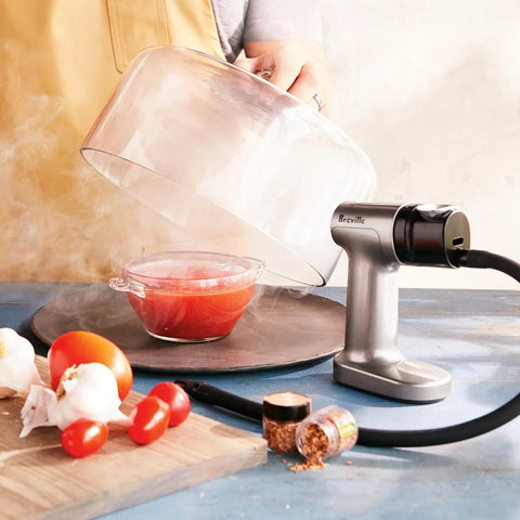 Breville close-up of removable burn chamber demonstrating simple loading