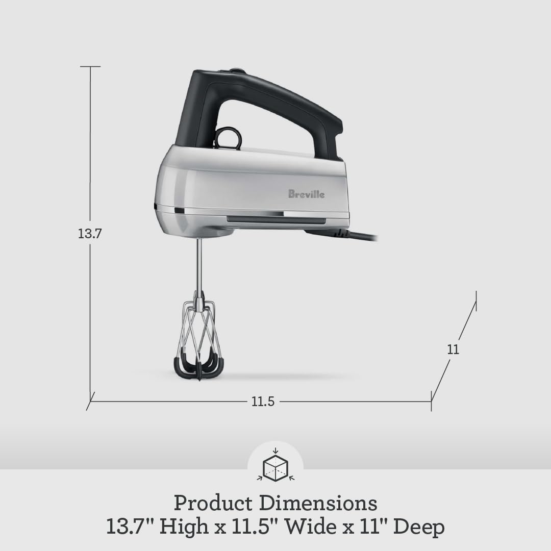 Breville next to a mug for scale showing compact, handheld size and comfortable grip