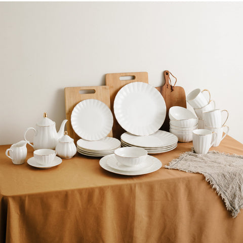 Brew To A Tea table setting with plates showing elegant entertaining benefit