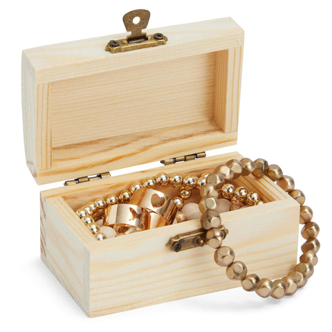 Bright Creations chest next to coin showing compact size and scale benefit