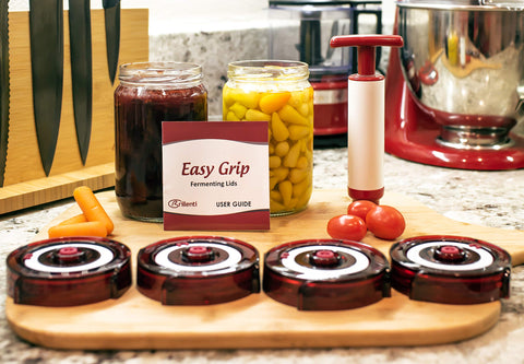 Brillenti low profile lids in cupboard showing space-saving storage