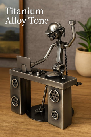 Broadway Gifts figurine placed on studio shelf by speakers, inspires creative workspace decor