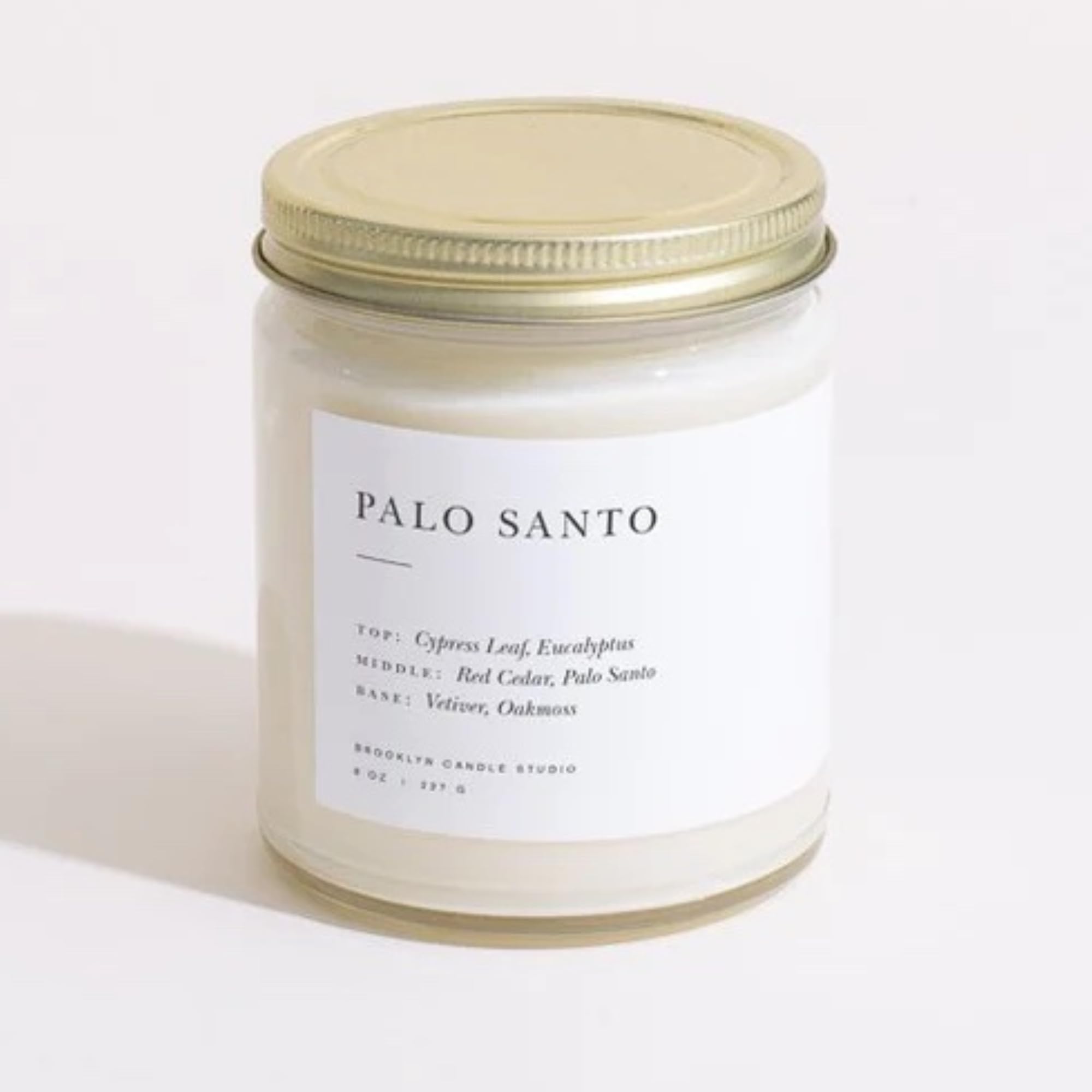 Brooklyn Candle Studio front jar view showing sleek packaging and warm scent
