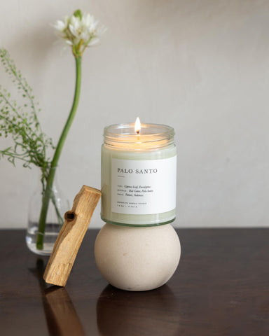 Brooklyn Candle Studio candle on coffee table adding calming atmosphere