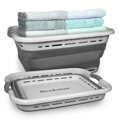 Brookstone front view of light grey collapsible hamper showing clean modern shape and storage benefit