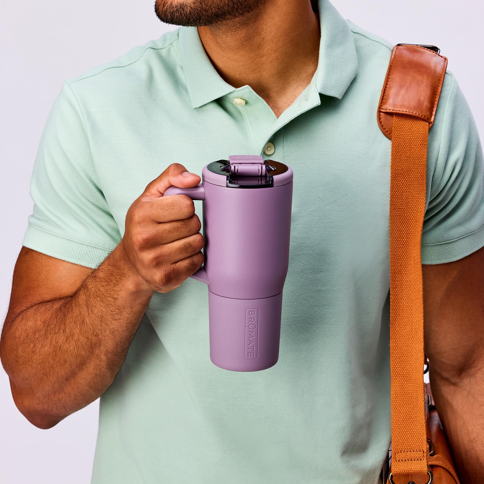 BrüMate Müv in commuter scene in Blue Agave, leakproof travel convenience