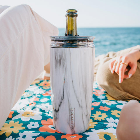 BrüMate Togosa pitcher pouring mimosas at brunch for easy spill-free serving