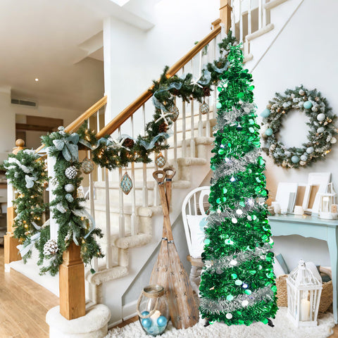 BTU tree beside sofa illustrating compact size and space-saving advantage