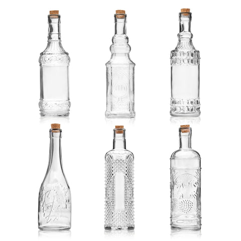 BULK PARADISE front view of six clear glass bottles showcasing uniform design and presentation benefit