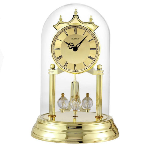 Bulova Tristan I front view showing polished brass finish and glass dome, elegant display