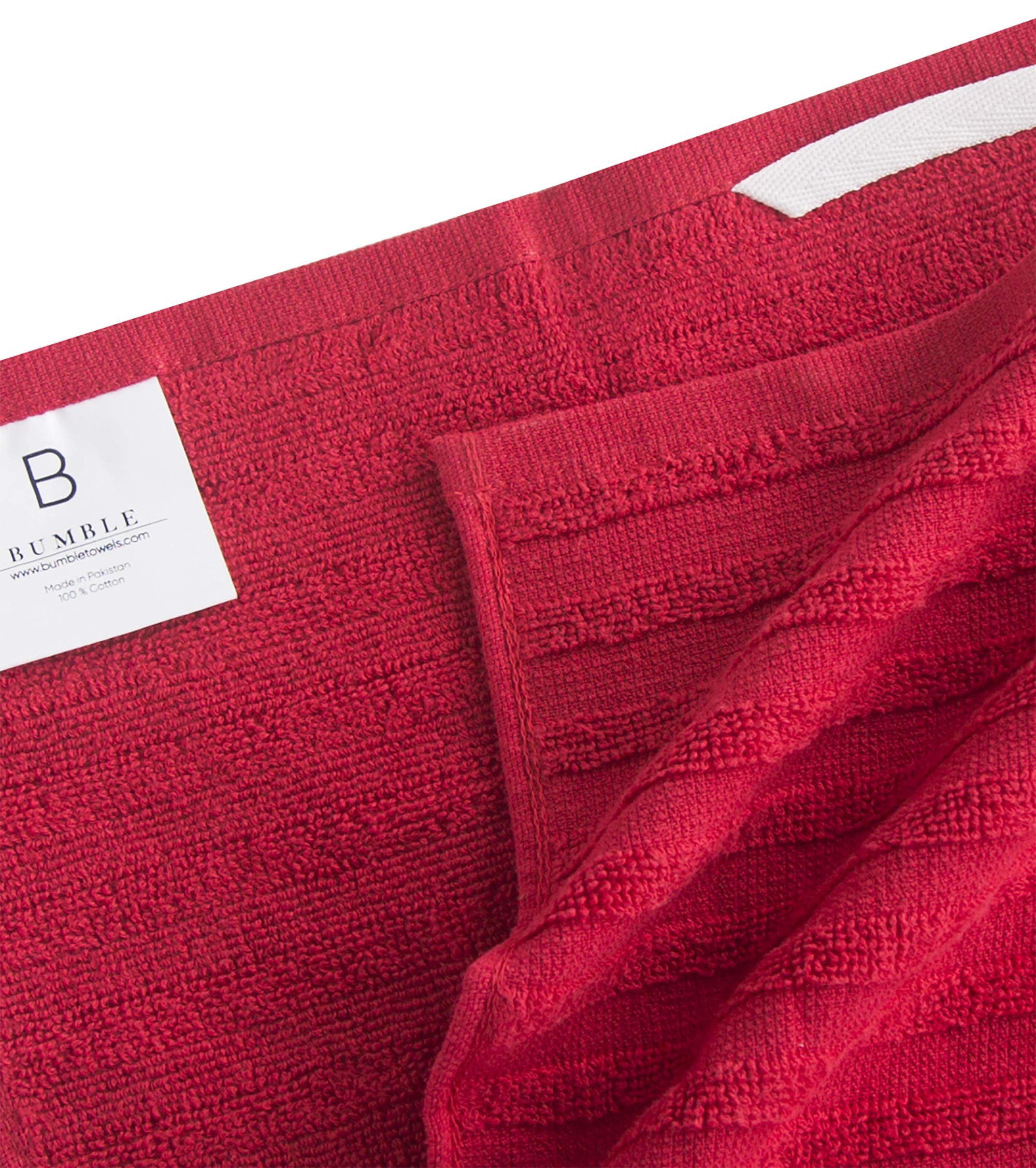Bumble Towels in use drying dishes at sink, demonstrating fast moisture pickup