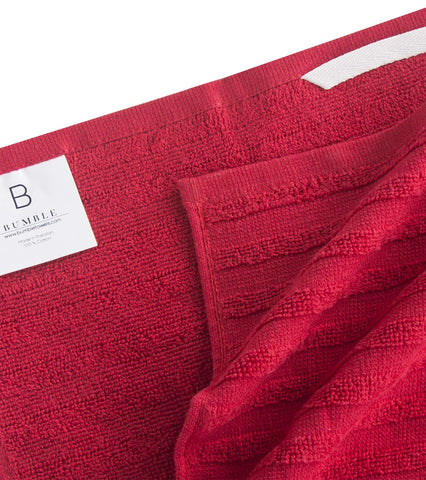 Bumble Towels in use drying dishes at sink, demonstrating fast moisture pickup