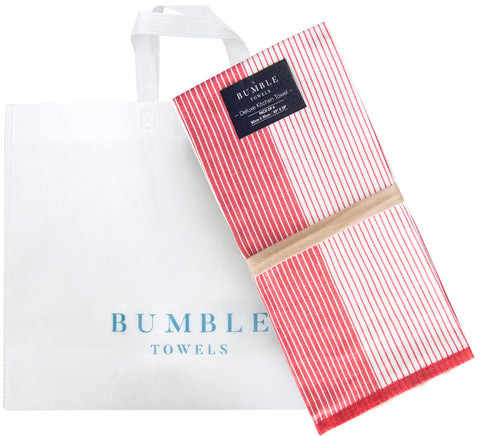 Bumble Towels size comparison beside sink showing 20x28 scale and versatility